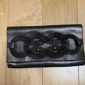 Decorative Leatherock clutch handbag